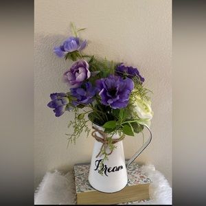Galvanized vase with flowers